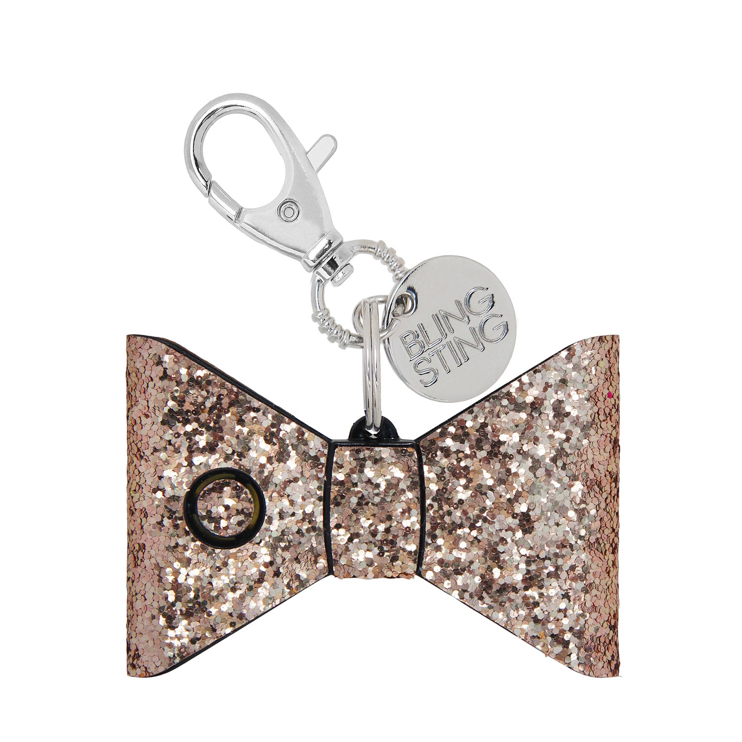 small compact personal safety alarm in a glittery bow shape with a keychain clip, an oversized lobster clip, a pink trigger button, and an LED safety light button operating on a 12-volt A23 battery available in rose gold