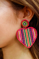 heart-shaped stud earrings with double-sided multicolored beading, a comfort replacement earring back, and plastic disk stopper style in silver and gold