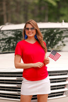 red basic short sleeve tee with rounded hemline and v-neck