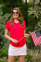 red basic short sleeve tee with rounded hemline and v-neck