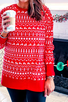 a red long-sleeve tunic made from comfy material with comfy material with a sublimation-printed Christmas pattern print (geometric designs, reindeer, Santa's sleigh, snowflakes, and trees) sublimation detail, ribbed accents (cuffs, neckline, and hem), side slits, and a relaxed fit