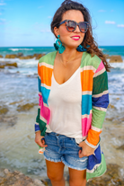 a lightweight open-front cardigan with a relaxed fit, breathable knit fabric, and bold multicolored vertical stripe design in dusty pink, kelly green, periwinkle, sage green, tangerine, and teal on a cream base