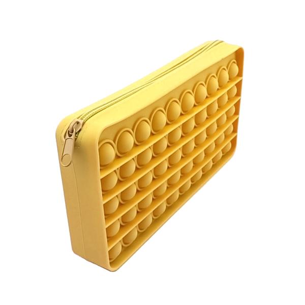 a waterproof yellow silicone zippered pencil case with poppable bubbles, a discreet popping sound, a comfortable touch, compact storage for small essentials, and an endlessly reusable, dishwasher-safe design for versatile daily use