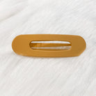 Raeh oversized spring back clip with curve design in peach