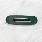 Raeh oversized spring back clip with curve design in hunter green