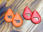 leather teardrop earrings with the State of Oklahoma cutout in the center, matching beading accent over the edges, and a fish hook