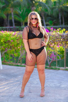 solid black two-piece triangle bikini with a back hook, removable padding, matching bottoms, and a sheer gold star pattern coverup