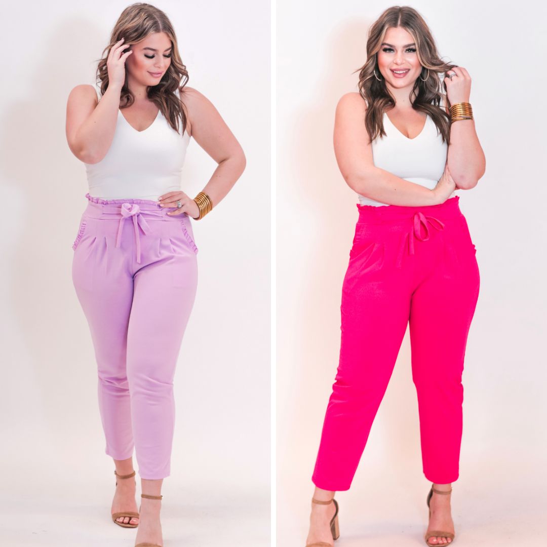 high-waisted paper-bag silhouette pants with a ruffle trim and sash tie, lightweight drapey fabric, straight legs, side pockets polished with a flirty ruffle, and unlined for breezy comfort in lavender and pink