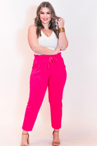 high-waisted paper-bag silhouette pants with a ruffle trim and sash tie, lightweight drapey fabric, straight legs, side pockets polished with a flirty ruffle, and unlined for breezy comfort in pink