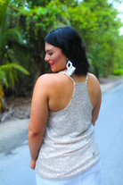 adjustable strap racerback style sleeveless cami with a v-neckline on a sequin fabric in champagne