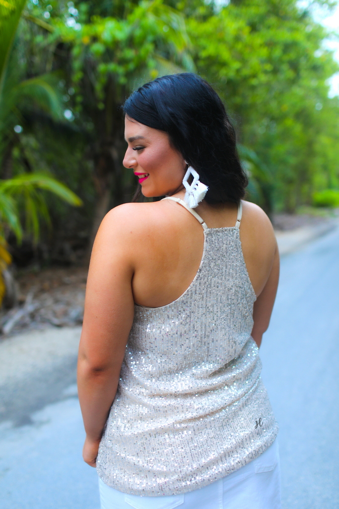 all-over sequins, a racerback style with adjustable straps, and a v-neck neckline