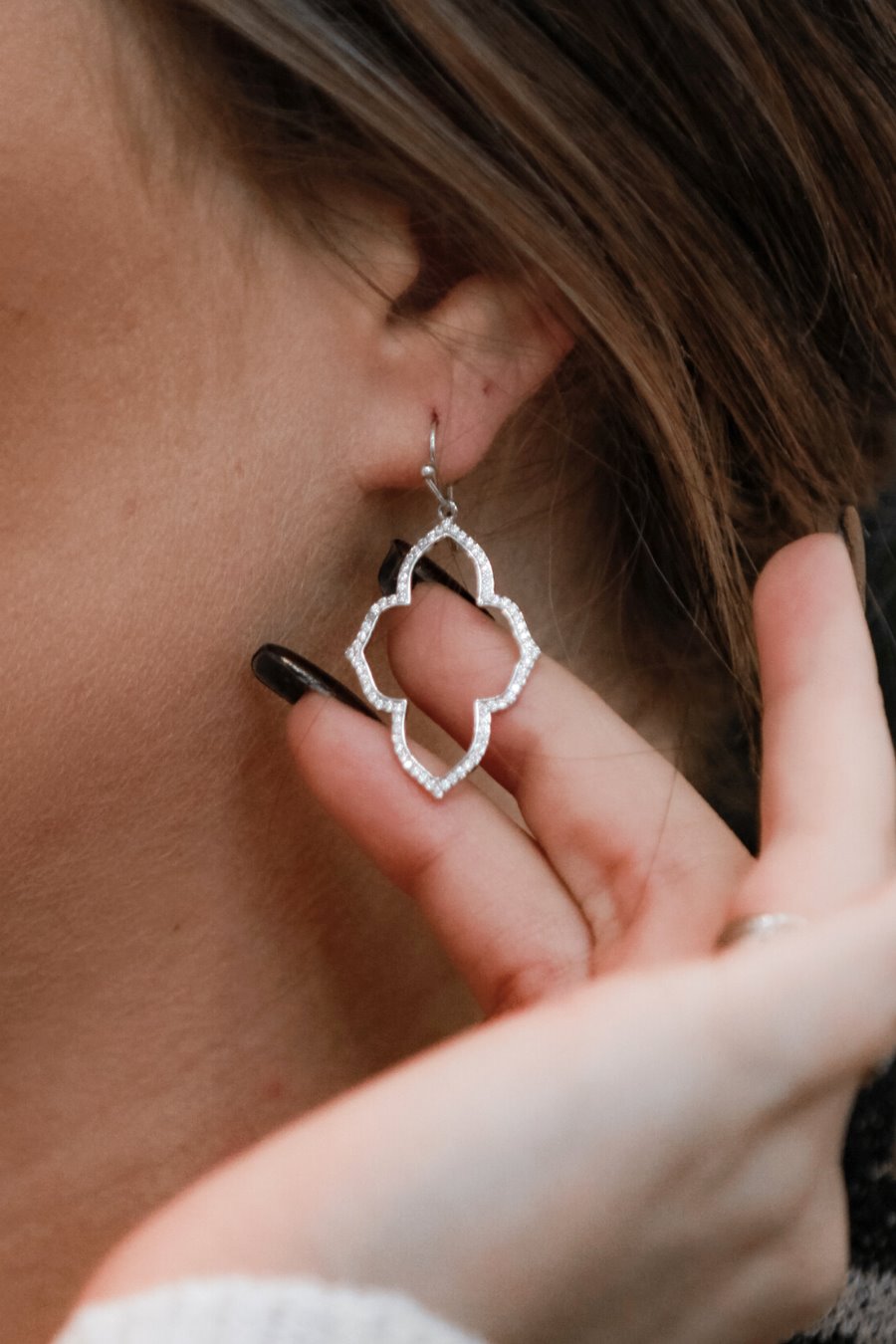 gold plated quatrefoil-shaped rhinestone hook earrings