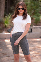 sleek lightweight biker shorts with a high elastic waistband for tummy control, side pockets, and a flattering figure-hugging short silhouette