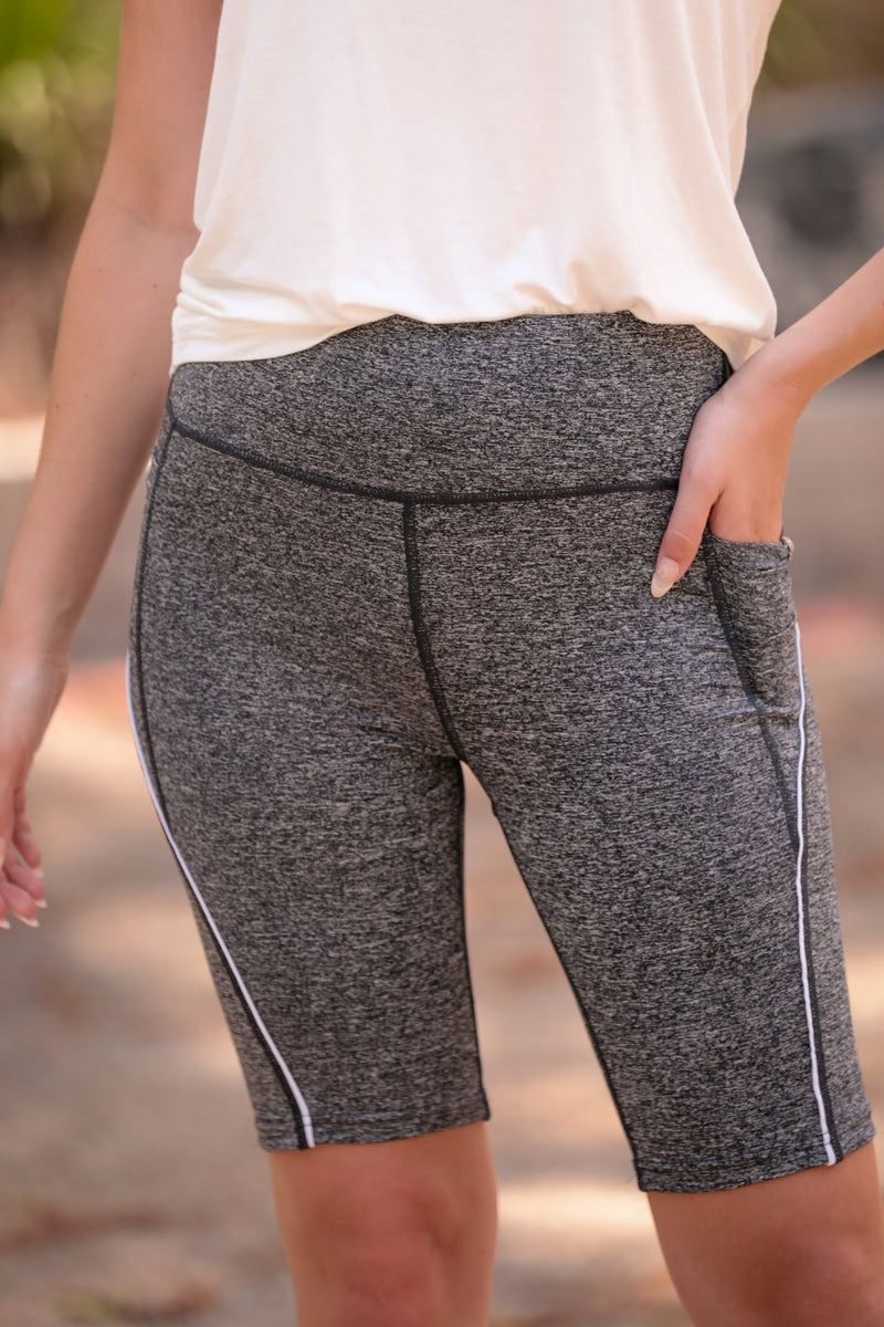 sleek lightweight biker shorts with a high elastic waistband for tummy control, side pockets, and a flattering figure-hugging short silhouette