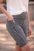 sleek lightweight biker shorts with a high elastic waistband for tummy control, side pockets, and a flattering figure-hugging short silhouette