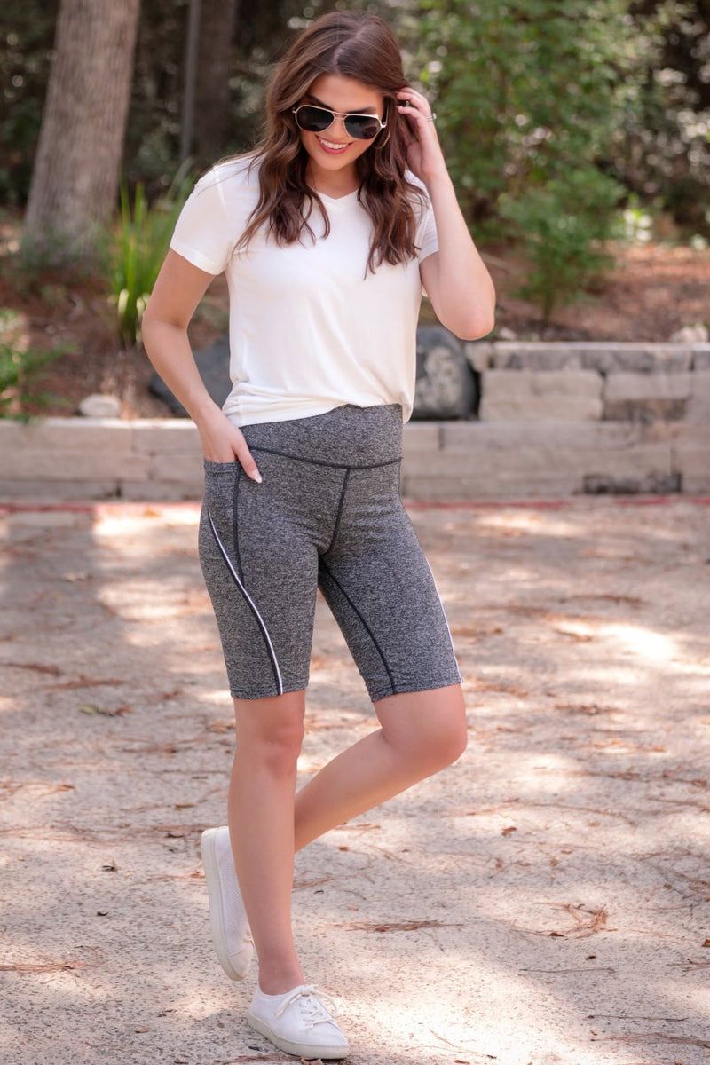 sleek lightweight biker shorts with a high elastic waistband for tummy control, side pockets, and a flattering figure-hugging short silhouette