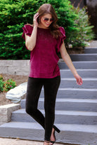ultra soft stretch leggings crafted from luxurious velvet fabric with an elastic waistband and flattering rise in black
