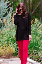 ultra soft stretch leggings crafted from luxurious velvet fabric with an elastic waistband and flattering rise in red