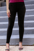 ultra soft stretch leggings crafted from luxurious velvet fabric with an elastic waistband and flattering rise in black
