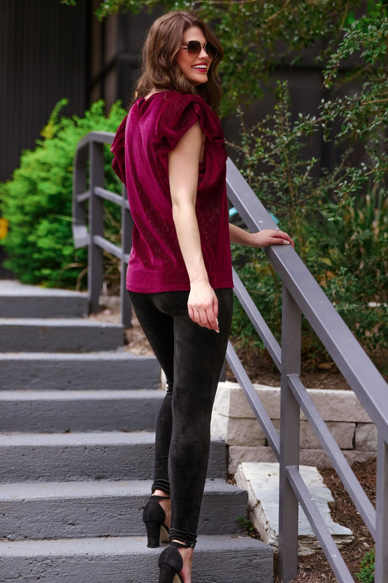 ultra soft stretch leggings crafted from luxurious velvet fabric with an elastic waistband and flattering rise in black