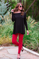ultra soft stretch leggings crafted from luxurious velvet fabric with an elastic waistband and flattering rise in red