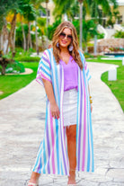 lightweight flowy material with pastel vertical stripes, short sleeves, and a relaxed open front silhouette that falls into a straight hemline